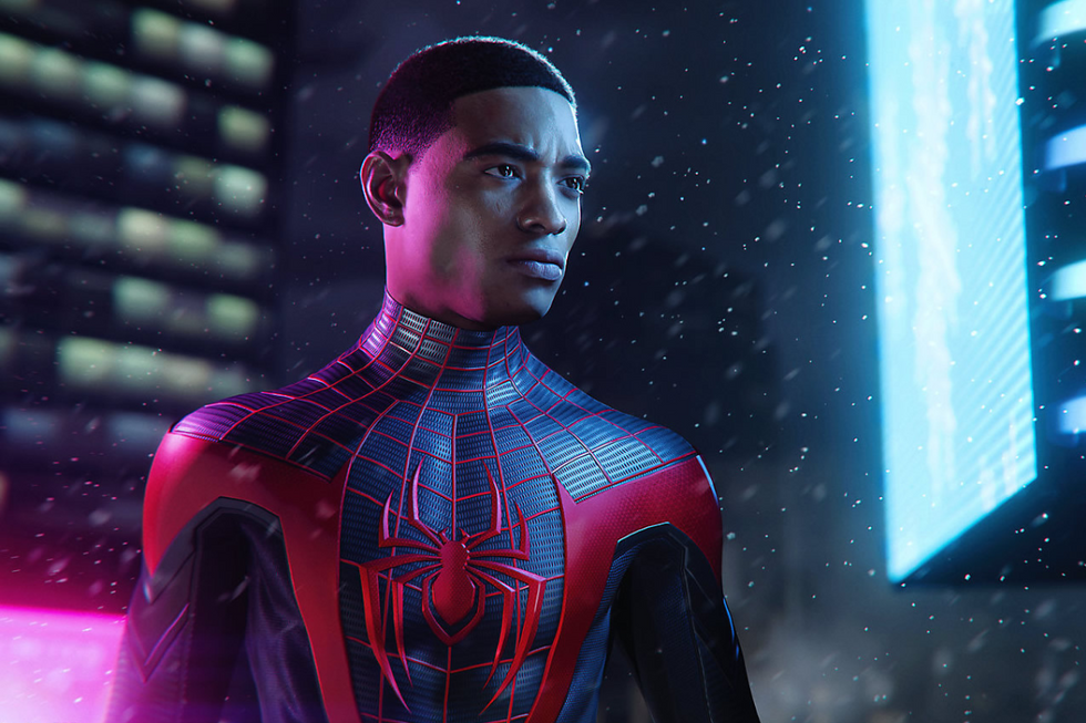 Miles Morales without his mask in his Spider-Man suit.